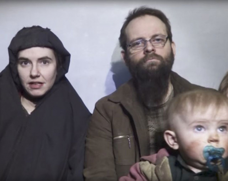 The Latest: Canadian ex-hostage says extremists killed child
