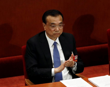 China's economy recovering but hard battle ahead: premier