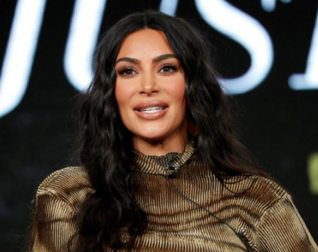 Kim Kardashian shrugs off critics, reveals law school progress