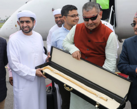 Dubai Prince gifts golden cane to UML central member Prasai