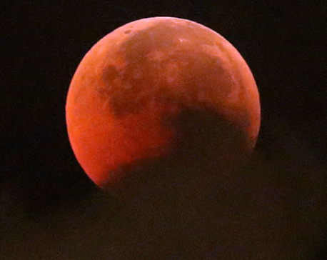 World marvels at longest ‘Blood Moon’ eclipse expected for a century (PHOTOS)