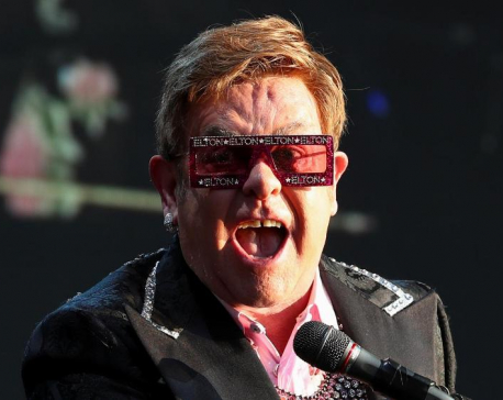 A day in Elton John's life: Buy Rolls, write hit song, dine with Ringo