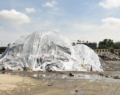 Garbage at the transfer station in Teku covered