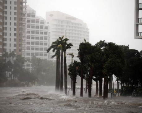 Weakening but still potent Irma aims full force at Florida's Gulf Coast