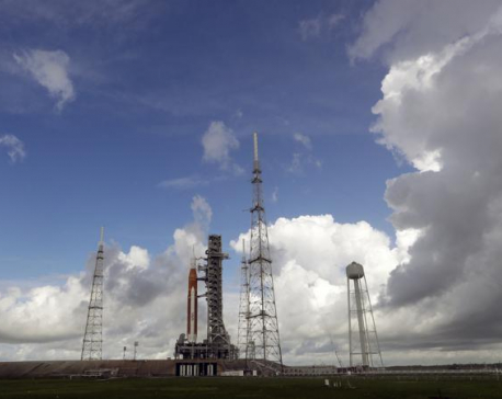 NASA presses toward moon rocket launch after fuel leak
