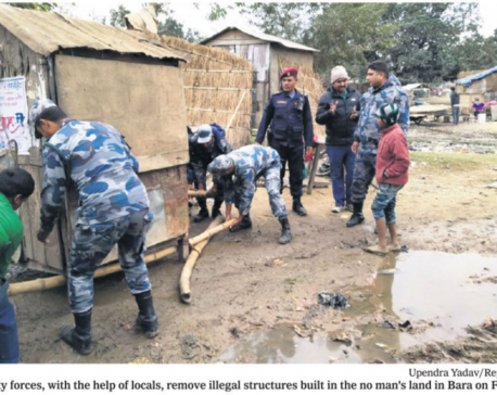 Security forces dismantle huts built along no-man's land
