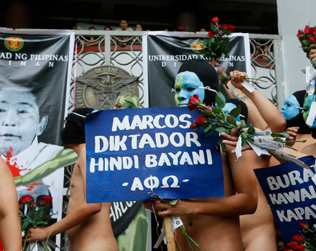 Nude students, Filipino activists protest dictator's burial