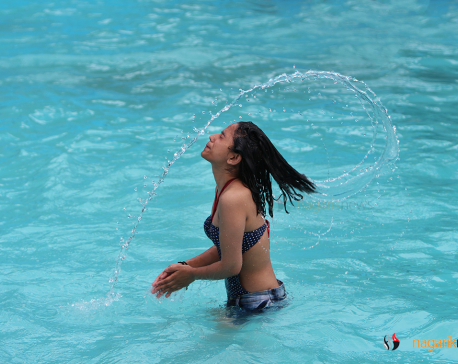 Kathmanduites take to swimming to beat the heat
