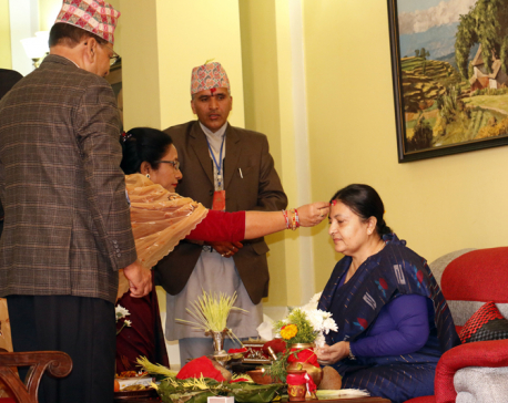 President Bhandari receives Dashain tika ( Photo Feature)