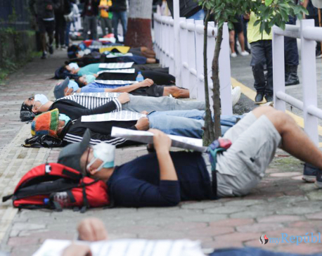 PHOTOS: Youths lie down on ground to protest against ‘lies’ in capital