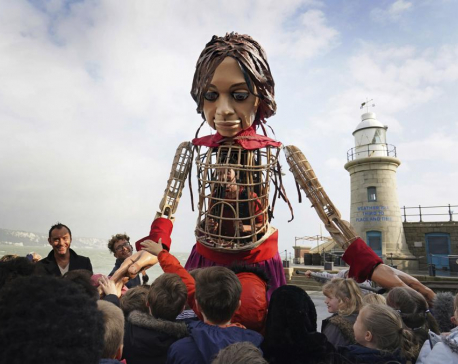 Puppet Little Amal arrives in UK after journey across Europe