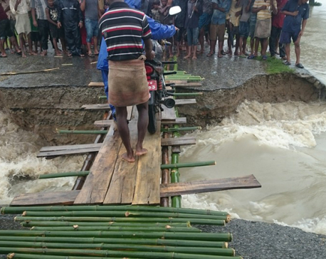 Flood sweeps away Rangeli-Urlabari Highway