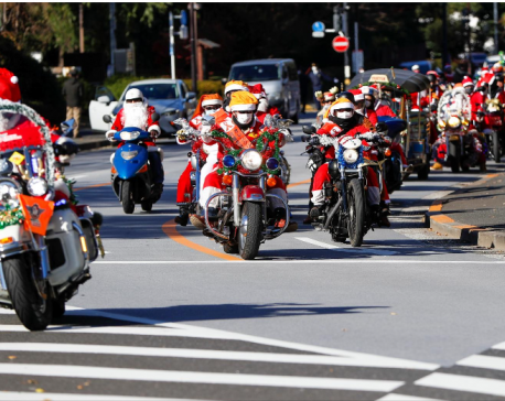 Santa Claus bikers parade in Tokyo against child abuse
