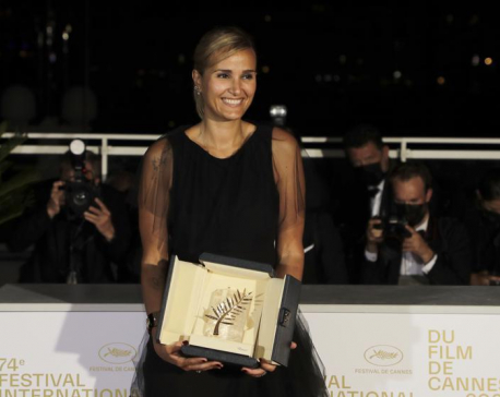 ‘Titane’ wins top Cannes honor, 2nd ever for female director