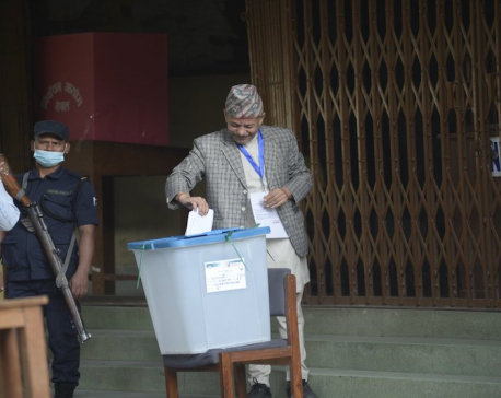 KMC mayoral candidate Keshav Sthapit casts his vote at PK Campus (with photos)