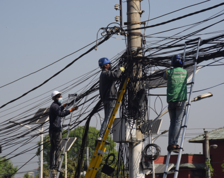 In Pictures: Kathmandu metropolis starts removing haphazardly placed internet, cable TV wire from city areas