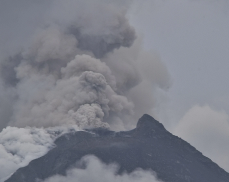 Indonesia evacuates about 6,500 people on the island of Flores after a volcano spews clouds of ash