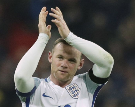 England's Wayne Rooney announces international retirement