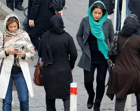 Woman is jailed for two years for taking off her obligatory Islamic headscarf in Iran