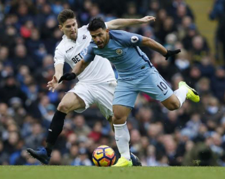 Jesus double lifts City to third with late Swansea win