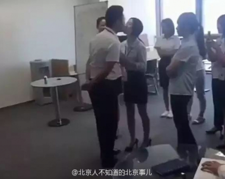 Company requires female staff to kiss boss