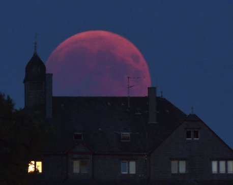 World gazes at the total lunar eclipse, longest of this century