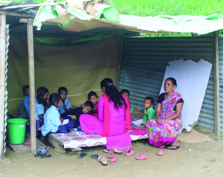 Kids studying in 'classroom' made of tin sheets