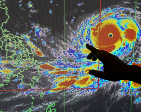 Evacuation underway as huge typhoon nears Philippines, China
