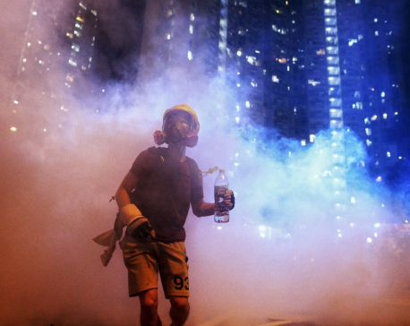 Hong Kong police arrest over 20 protesters in new scuffles