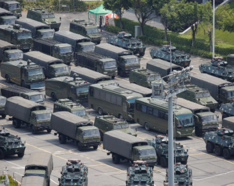 In 'clear warning', Chinese paramilitary forces exercise near Hong Kong