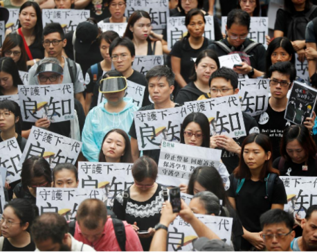 Hong Kong tense as weekend of protests begins with teachers' rally in rain