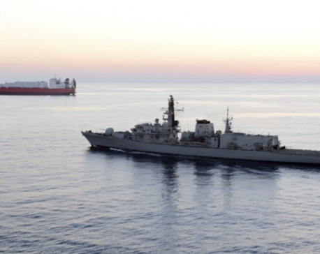 Britain says Iranian vessels tried to block ship in Gulf