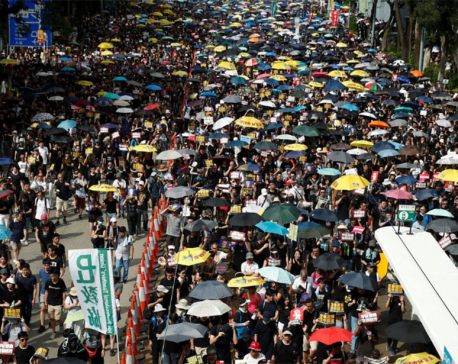 Hong Kong on security alert as thousands march in fresh wave of protests