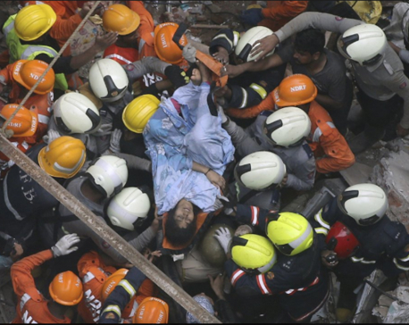 UPDATE: Rescuers find 14 bodies after building collapse in India