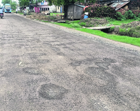 Blacktopped road damaged within a month of construction