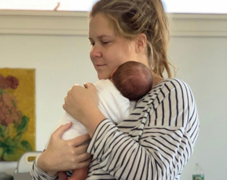Amy Schumer calls parenting "nuts"