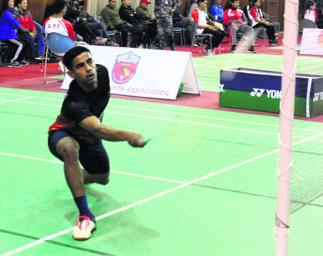 Dhami reaches badminton semis in three categories