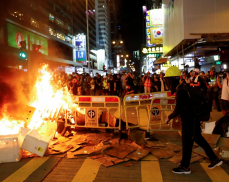 Hong Kong police break up new protest with rubber bullets, tear gas