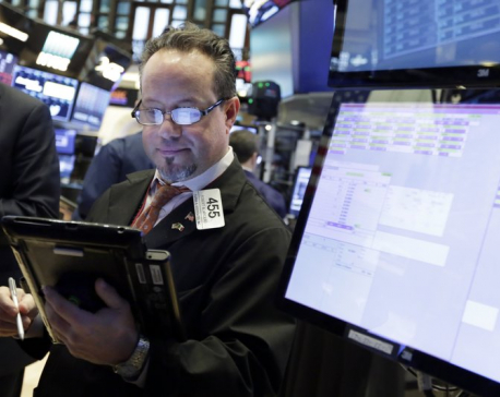 US stocks swing back to gains, Dow up 330 on turbulent day