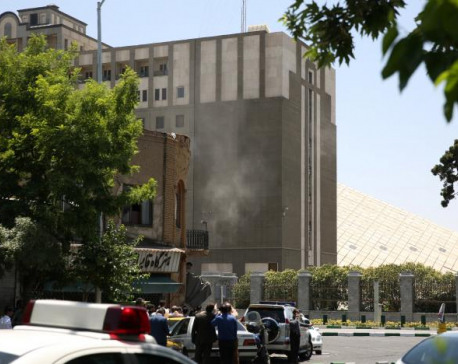 Attackers raid Iran parliament and mausoleum, up to seven dead: Iranian media (Update)
