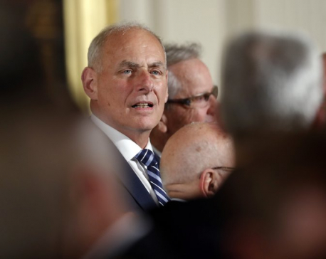 Kelly flexes muscle his first day on the job at White House