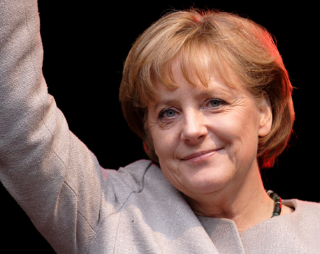 Merkel pledges big effort to hold EU together