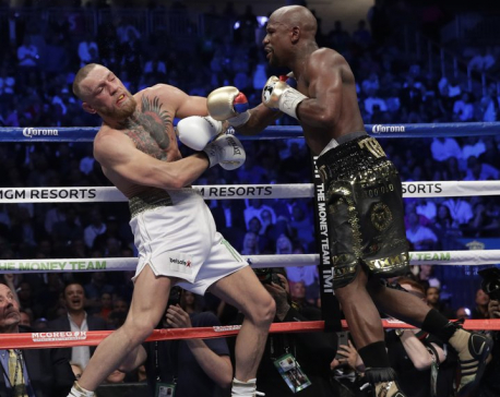 Mayweather dominates McGregor in late rounds to go 50-0