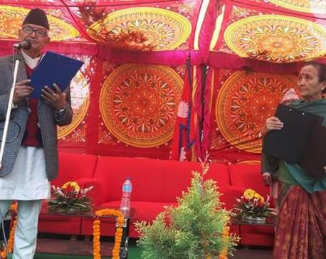 Anuradha Koirala administers oath to Dormani Paudel