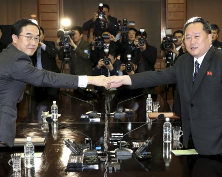 Rival Koreas begin high-level talks meant to set up summit