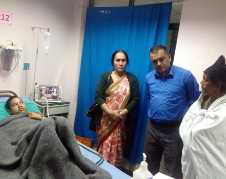 Health Minister Thapa visits burn-injured Raute youth (with video)