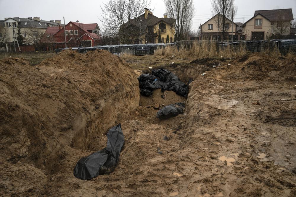 Ukraine accuses Russia of massacre, city strewn with bodies