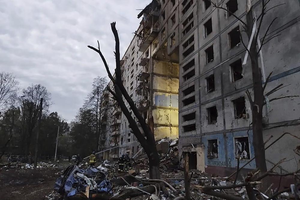 Ukraine: Russian strikes kill at least 12 after bridge blast