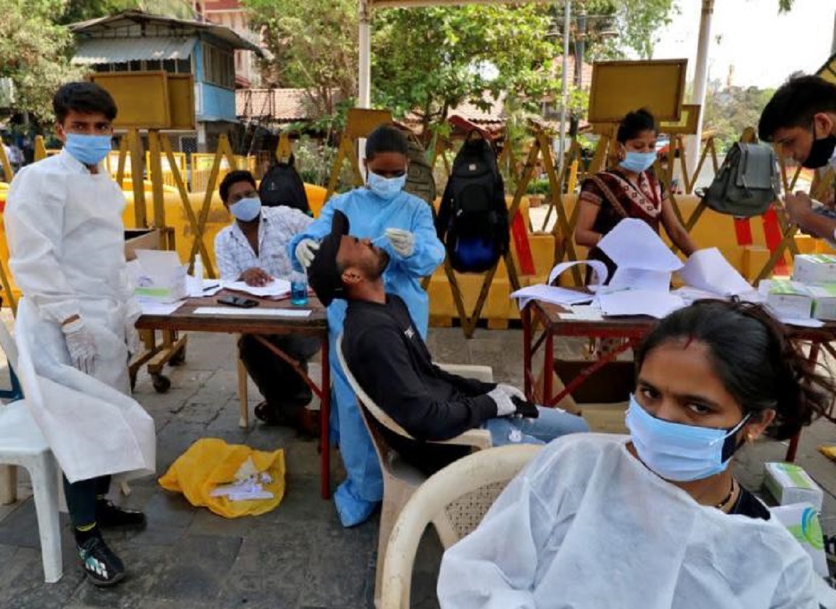 India reports a record 131,968 new COVID-19 infections