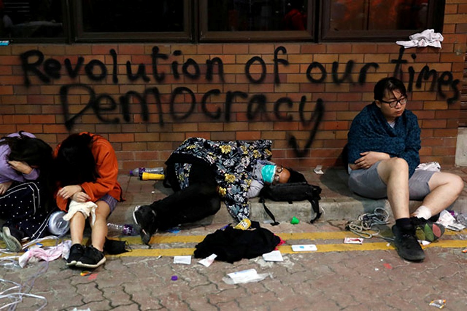 Student protesters hold out as Hong Kong leader urges peaceful resolution